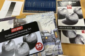 art supplies, Professional Drawing set package of shading pencils, colored pencils, sketchpads and a chart ranging light to dark